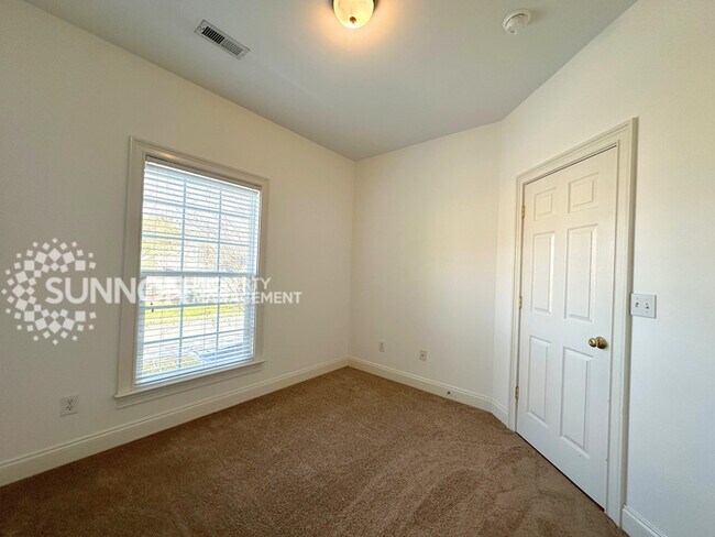 Building Photo - Wooded, Charming 3 Bedroom with Tons of Space