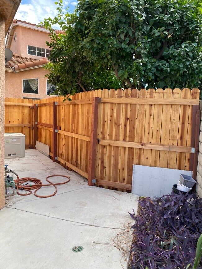 New Fencing in Backyard - 915 W Arrow Hwy