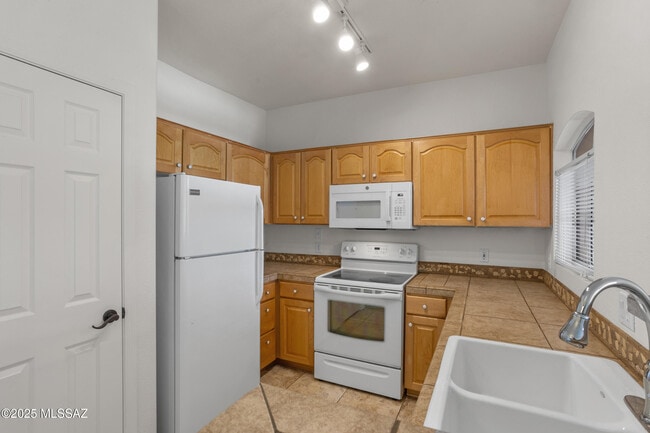 Building Photo - 7050 E Sunrise Dr
