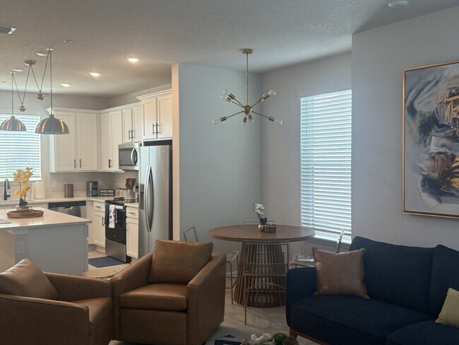 Building Photo - Modern 2-Bedroom Townhome with Garage Park...