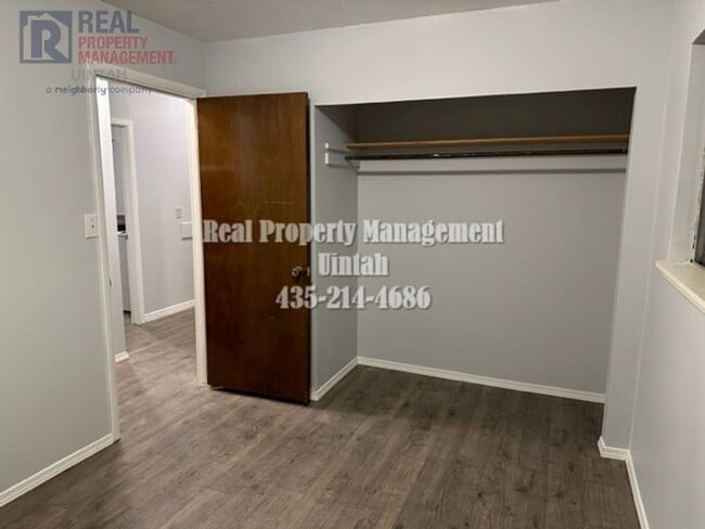 Building Photo - Cute 1-to-2-bedroom apartment