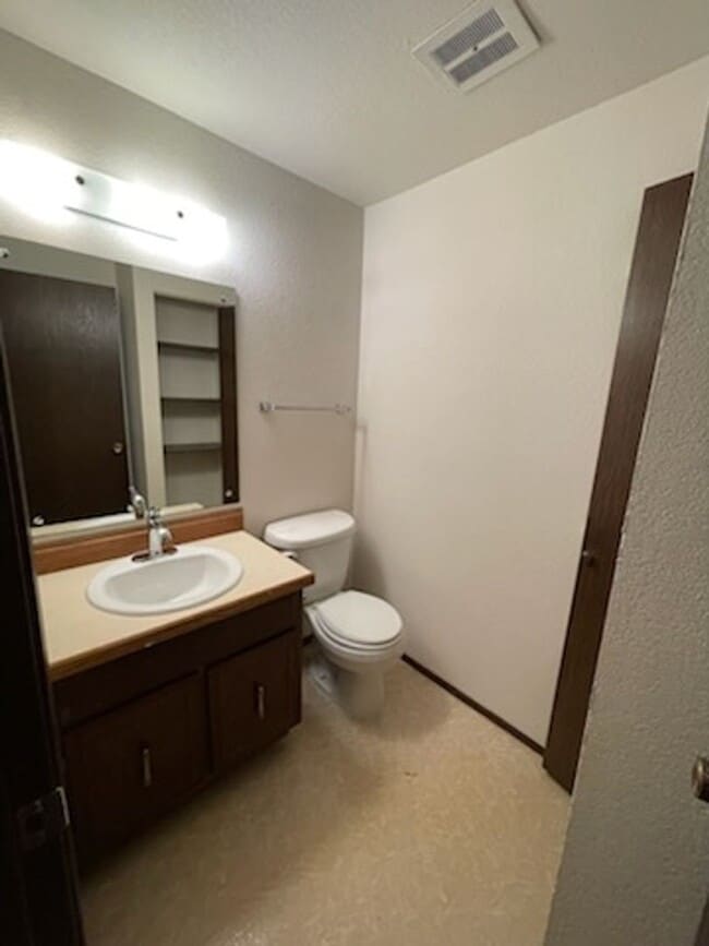 Building Photo - Spacious 2-Bed, 1.5-Bath Home with Firepla...