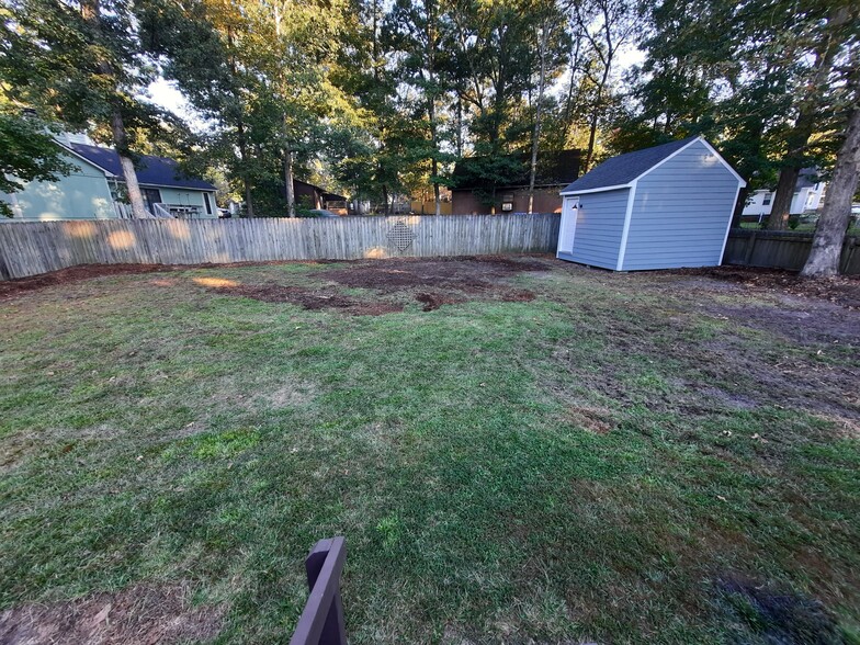 Fenced-in backyard with shed - 1717 Old Barn Rd