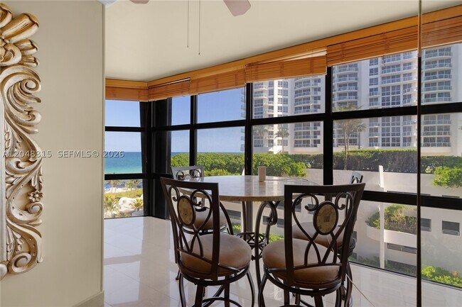 Building Photo - 6423 Collins Ave