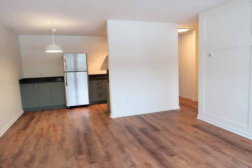 Living room to kitchen - 2616 Harriet Ave S #203