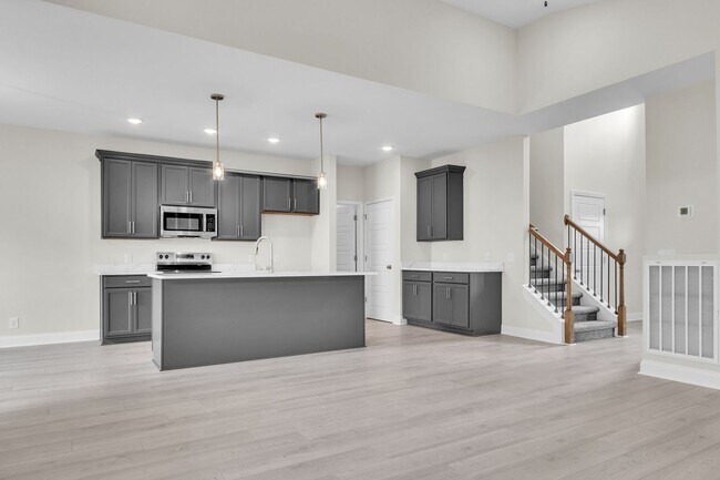Building Photo - 1 Month Free! New Construction Ruby Floor ...