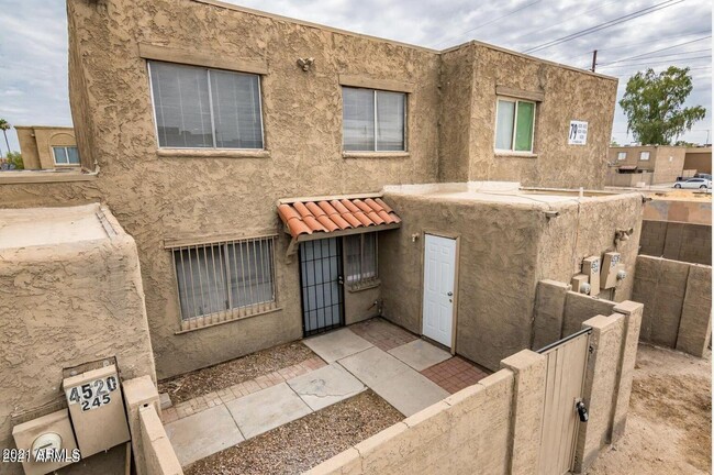 Building Photo - 4522 E Pueblo Ave
