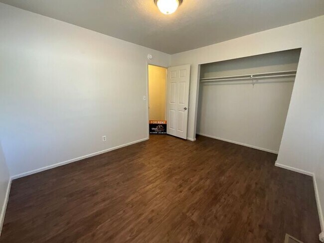 Building Photo - 4 Bedroom 2 Bath Duplex- Carport