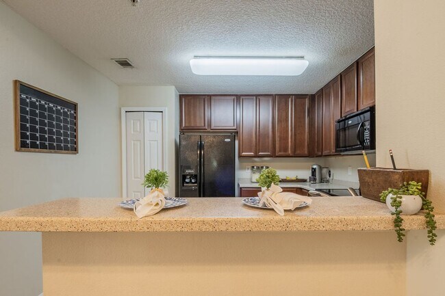 Building Photo - Heron's Landing End Unit Overlooking the Sparkling Community Pool