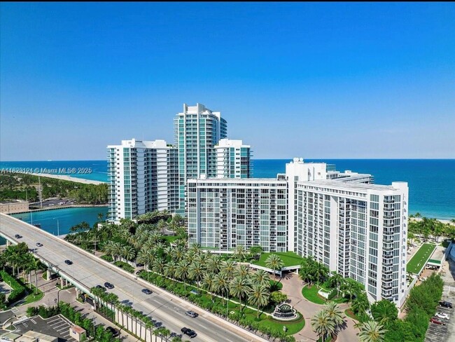 Building Photo - 10275 Collins Ave