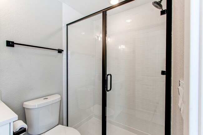 Third bedroom ensuite three-quarter bath - 8500 W 62nd Ave