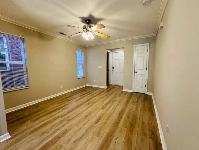 Building Photo - 2 bed, 2.5 bath updated townhouse w/ 1-car garage & Trex deck available now