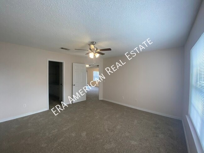 Building Photo - 7418 Woodmont Rd