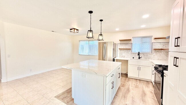Building Photo - Wonderful Single-Story Home with Remodeled Kitchen and Baths, Fresh Paint, and Minutes to downtow...