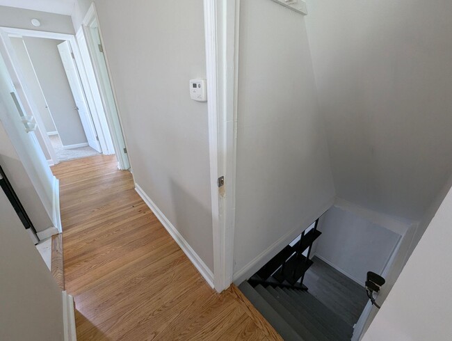 Building Photo - Updated Open-Concept with Sunroom & Finished Basement Space