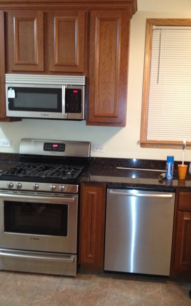 Building Photo - 8615 S Colfax Ave