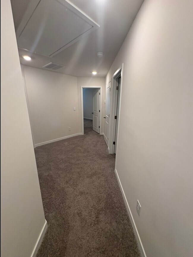 Building Photo - BRAND NEW TOWNHOME w/ Garage Parking