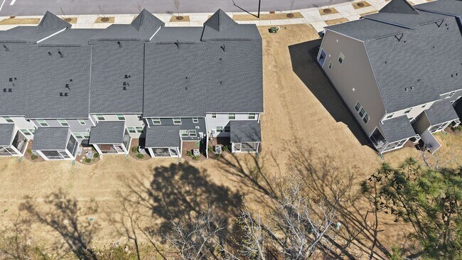 Building Photo - Upgraded 3BR Townhome in Wake Forest | Open Layout, Garage & Resort-Style Amenities