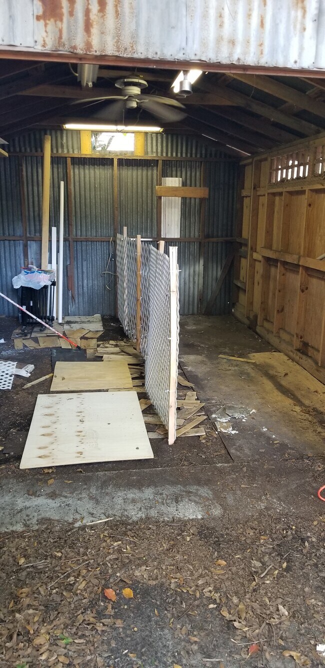 Locked storage shed. - 208 NW 3rd St