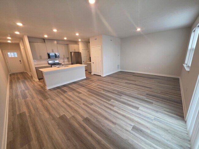 Building Photo - Luxury 4-Bedroom Townhome with Finished Walkout Basement & River Views