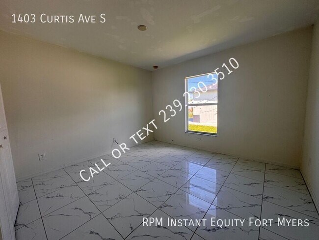 Building Photo - 1403 Curtis Ave S