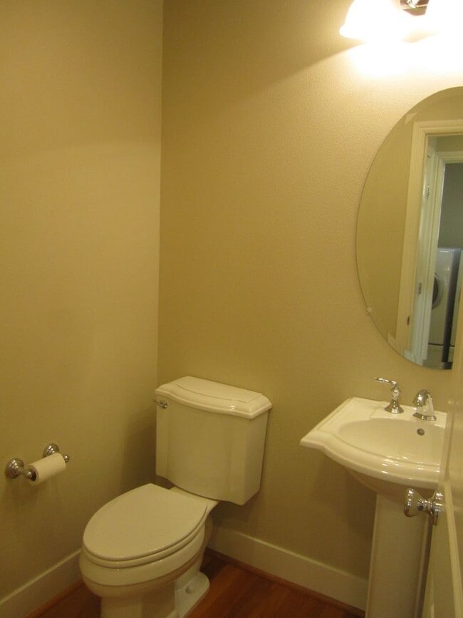 Building Photo - SPACIOUS 3 BEDROOM, 3.5 BATHROOM TOWNHOUSE...