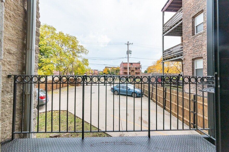 View from Back Balcony and Building Parking Lot - 6217 S Kimbark Ave