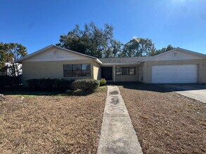 Building Photo - "Spacious 4-Bedroom Oasis with 2 Baths in Tampa – Your Perfect Family Retreat!"