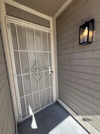 Building Photo - Downstairs 2BR/1BA—recently updated with new flooring, new countertops, and clean, neutral finishes.