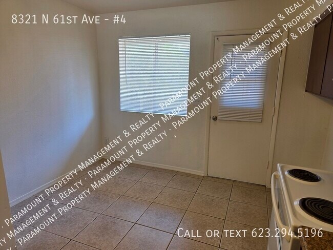 Building Photo - 8321 N 61st Ave