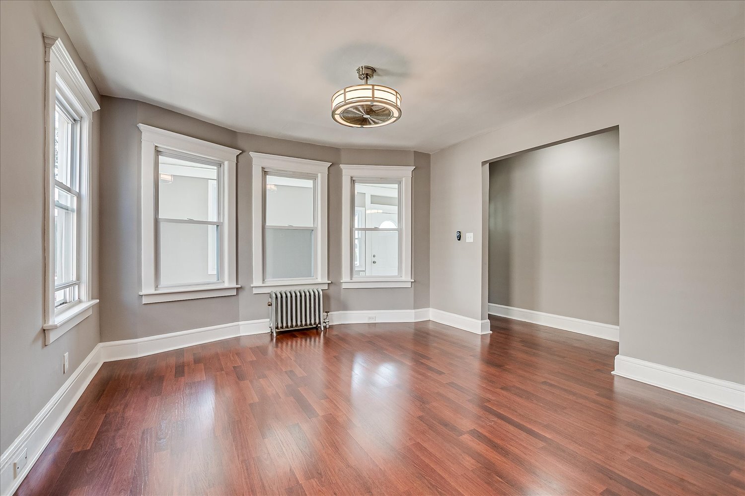livingroom view 2, new wood flooring, high ceilings, lighting, freshly painted - 128 Berwick St