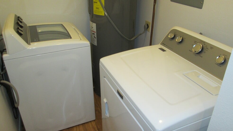 Full laundry room with energy efficient, large capacity W/D - 1440 Edora Rd