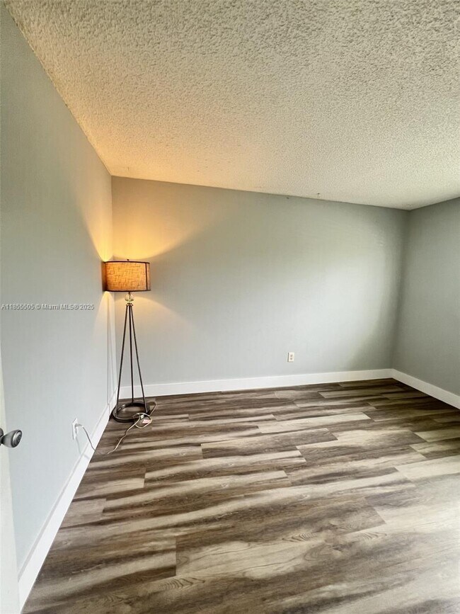 Building Photo - 10155 Boca Bend E