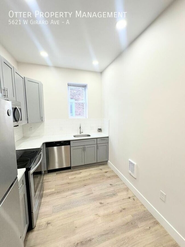 Building Photo - 5621 W Girard Ave