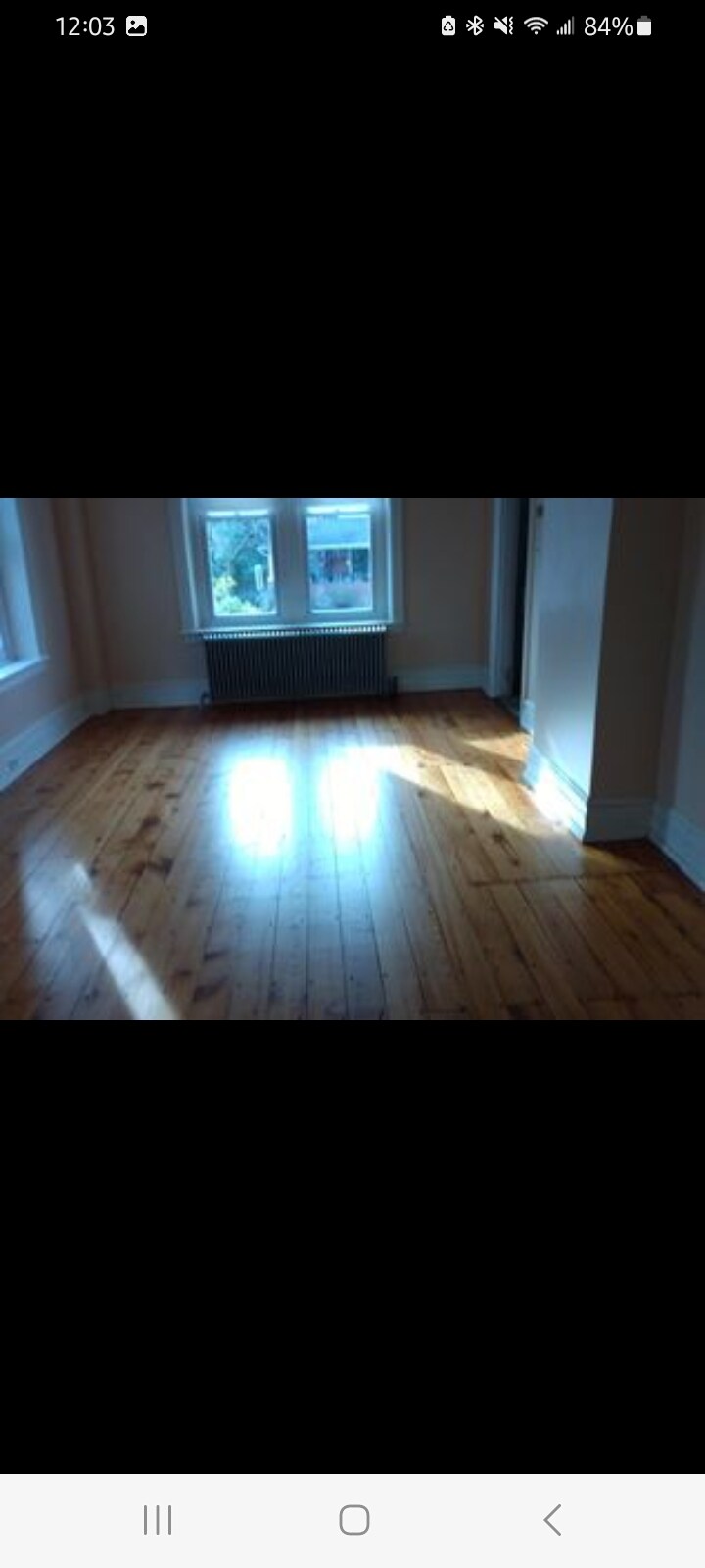 Living room/pumpkin pine floors - 417 W Walnut St