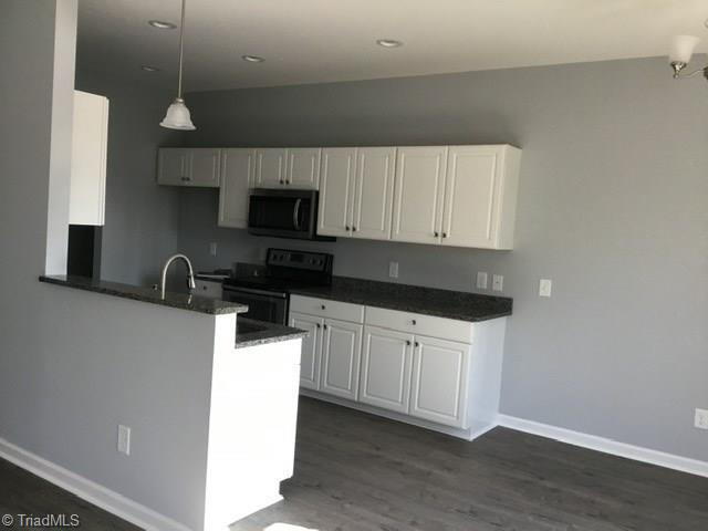 Building Photo - "Spacious 4-Bedroom Home with Finished Basement in Kernersville's Desirable Mill Brook Trail"