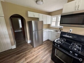 Building Photo - Spacious and Cozy 4-bedroom Home!