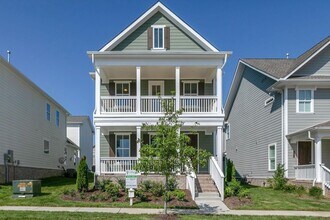Building Photo - Welcome to your dream home in desirable Tollgate Village!