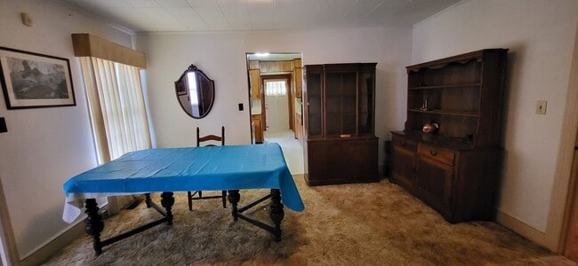 Building Photo - 2-bedroom, 1-bath partially furnished home