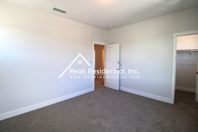 Building Photo - 4 br, 3 bath House - 8200 Triplefin Way