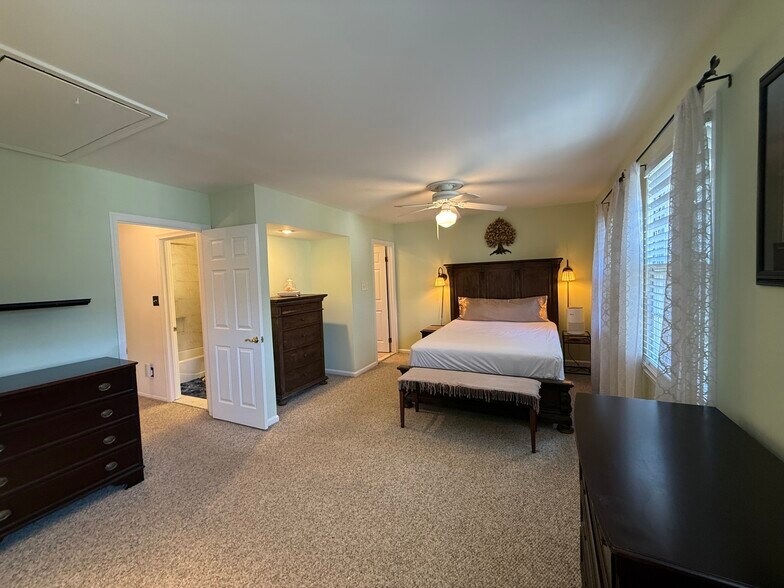 Master bedroom, 3 large windows for ample natural light and a large walk in closet. - 3307 Webley Ct