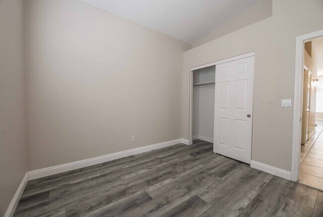 Building Photo - STUNNING 3 Bedroom Home with a 3 CAR GARAGE & RV PARKING!