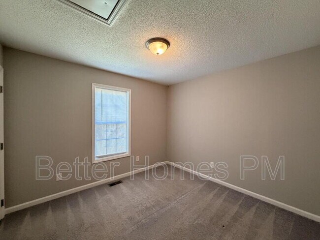 Building Photo - 5716 Woof Pl
