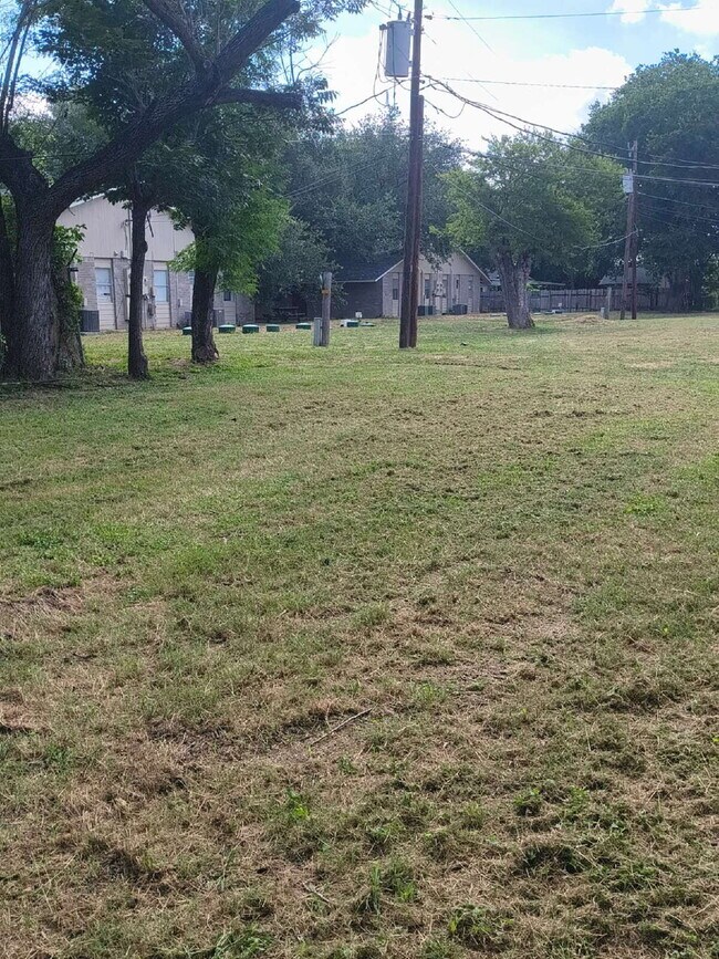 Building Photo - Pecan Cove Apartments – Hidden Gem - Secluded - Tranquil - 2 Bedroom Apartment homes located on a...