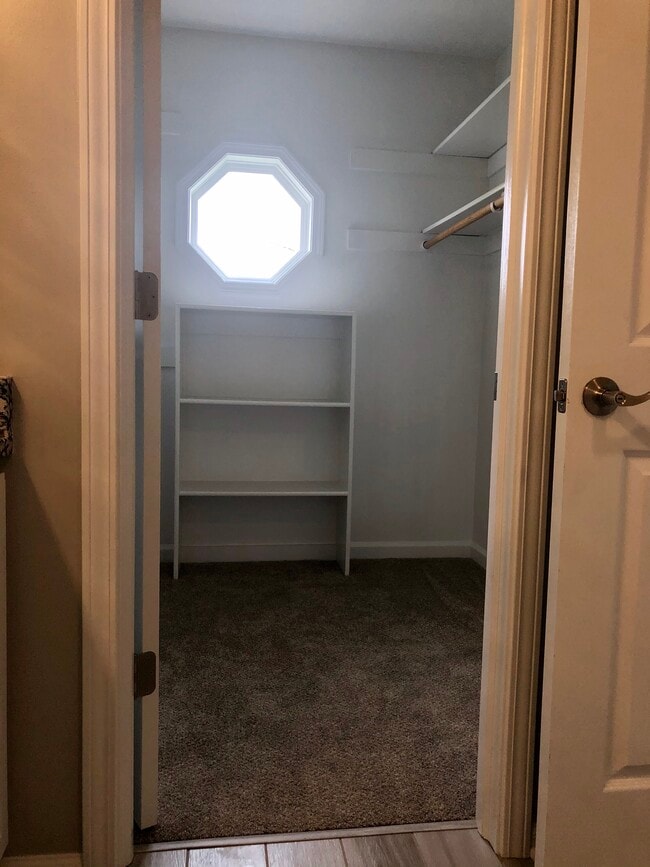 walk in master closet - 230 Heritage Ln