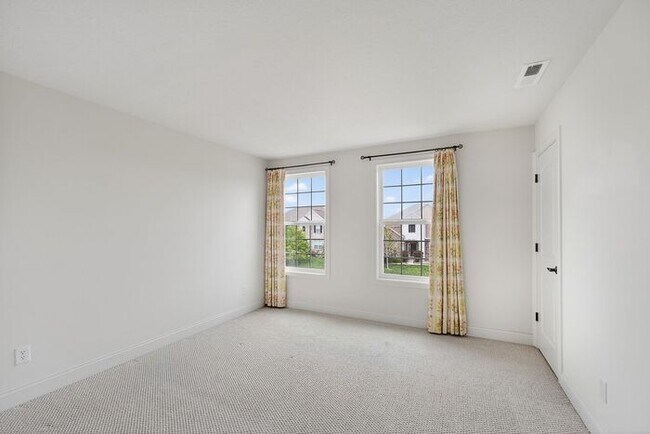 Building Photo - Modern Luxury with Waterfront Views in West Carmel