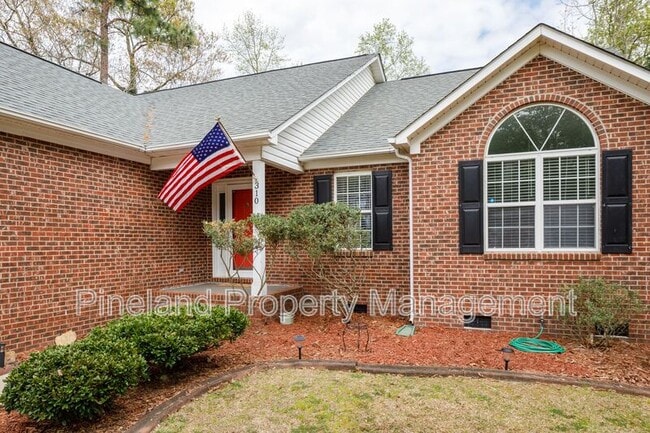 Building Photo - 310 Timberidge Dr