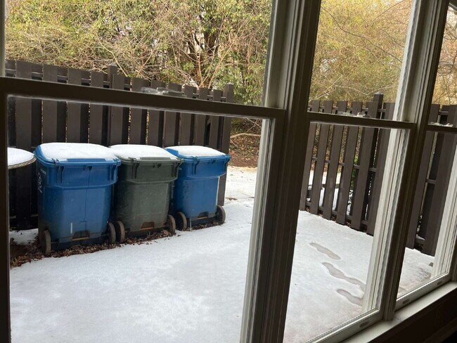 Building Photo - Charming 3 bedroom 2 bath townhome with lots of light and open downstairs. Galley kitchen, lots o...