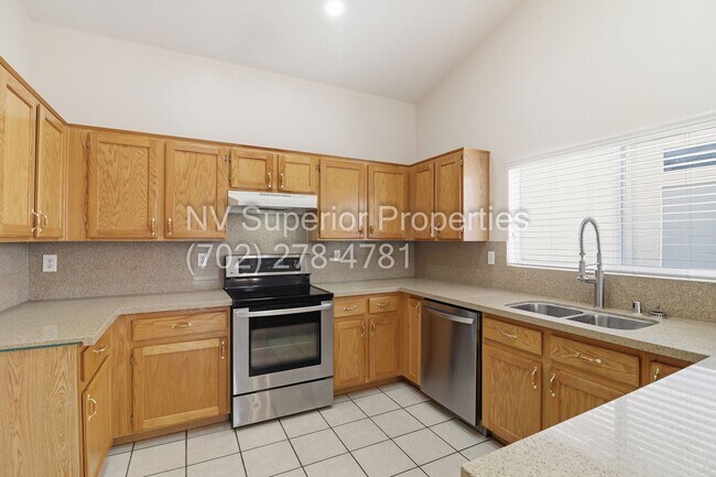 Building Photo - NW!! Single Story!!! 3 Car Garage!!  2 Masters!!! Low Maintenance desert landscape front yard!!  ...