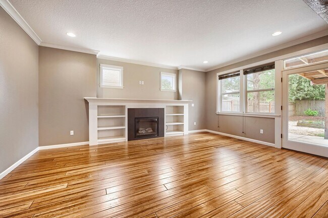 Building Photo - Custom-Built 4BR/2.5BA Two-Story Near Woodstock — Quartz Island Kitchen, Gas Fireplace & Fenced Y...